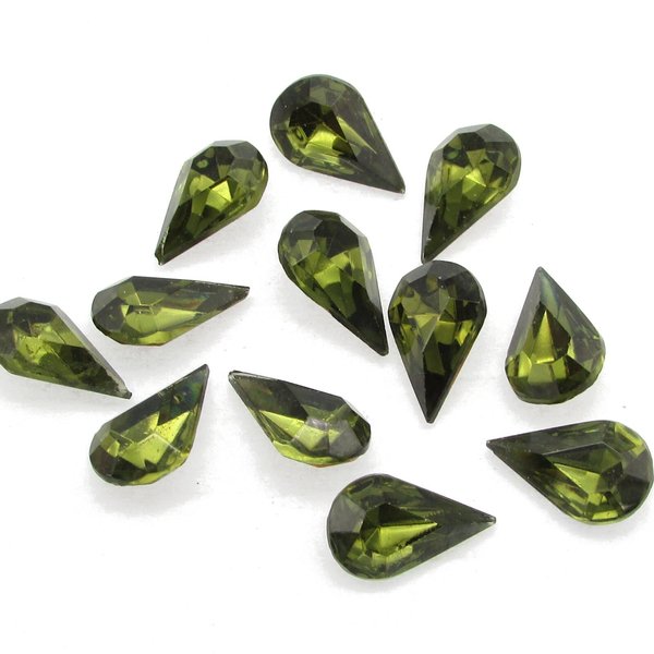 Vintage tin table cut pear shape rhinestones are translucent dark olive green backed with gold foil. Point back stones measure 13mm long and 8mm wide.