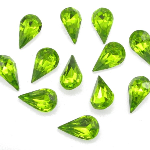 Vintage tin table cut pear shape rhinestones are translucent bright olive green backed with gold foil. Point back stones measure 13mm long and 7.8mm wide.