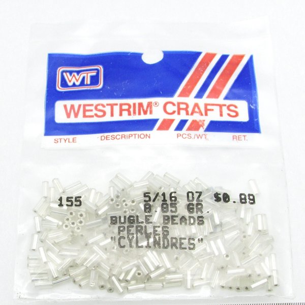 Vintage silver foiled bugle beads are still sealed in their original packaging. Tiny cylinders measure 5mm long by 2mm wide.
