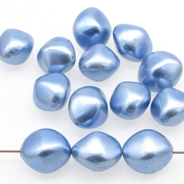 Lustrous, opaque blue plastic pearl bicone beads measure approximately 18mm long and 16mm wide. Center-drilled lengthwise holes are approximately 1mm. 
