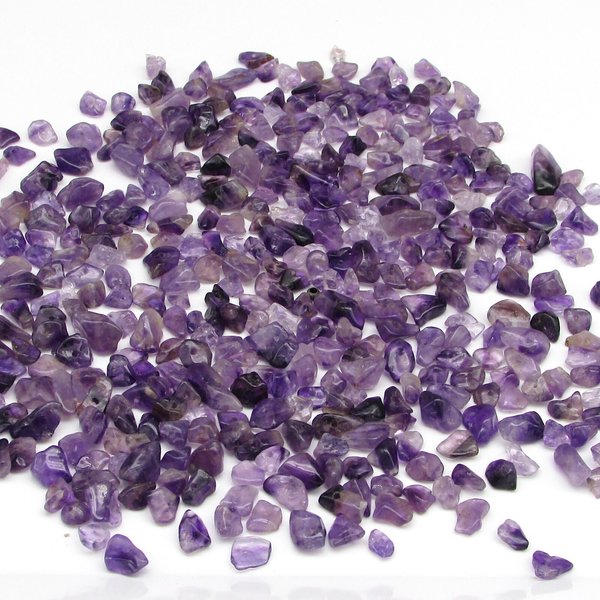 Polished amethyst beads are irregular gemstone nuggets measuring 3mm to 8mm long, with 0.8mm holes.