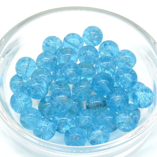 Round crackled glass beads measure 8mm in diameter with center-drilled 1mm holes. Available in several translucent colors.