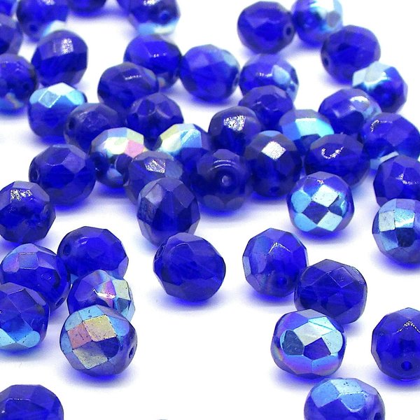 Iridescent blue Czech glass beads are fire polished rounds measuring approximately 8mm long and 7.5mm wide, with an approximate hole size of 1.25mm.