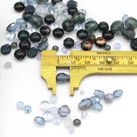 One of the small beads from the mix measured with a brass caliper.