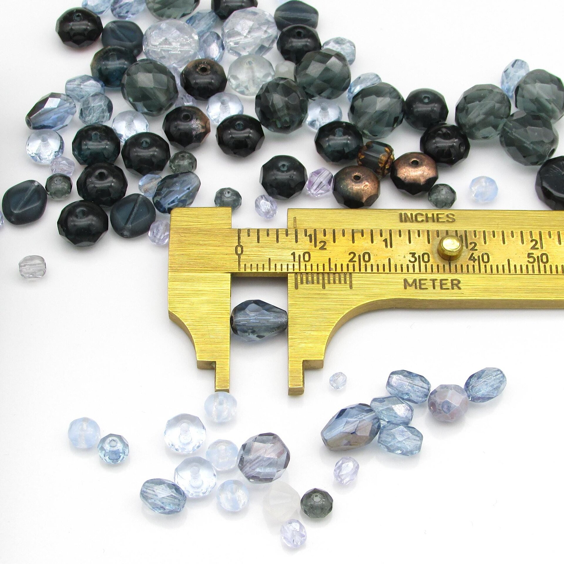 One of the small beads from the mix measured with a brass caliper.
