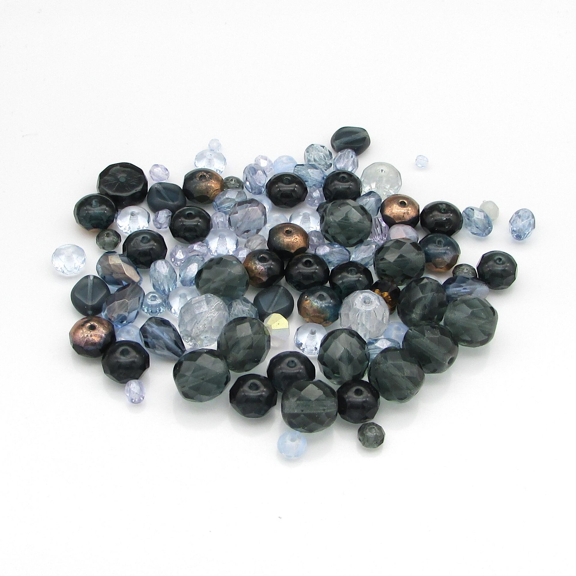 Montana blue bead mix has 95 assorted Czech fire polished beads in shades of smoky blue-gray, pale sapphire blue, and crystal. 