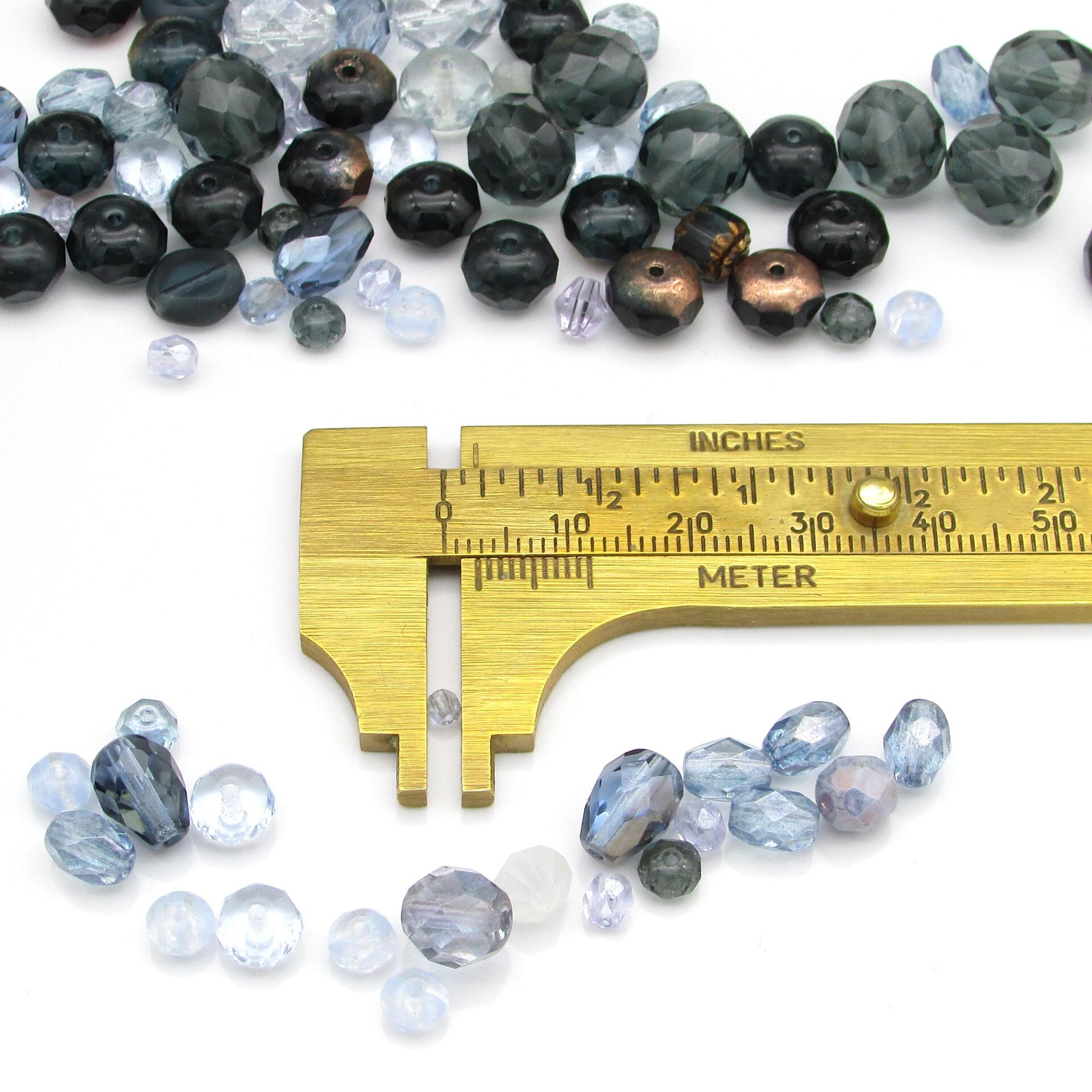 One of the small beads from the mix measured with a brass caliper.