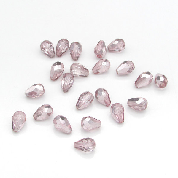 Translucent light rose faceted teardrop beads measure 10mm long and 7mm wide. with 1mm lengthwise holes and have a silvery metallic coating for extra sparkle. These fire polished glass beads are just the right size for making dangle earrings and charms!